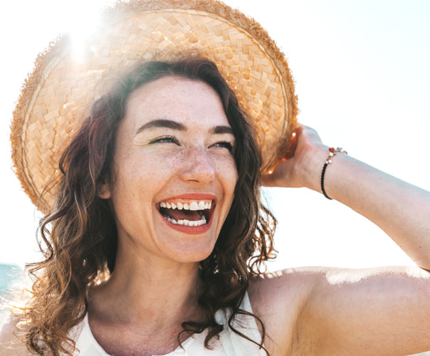 woman-happy-on-beach-in-florida